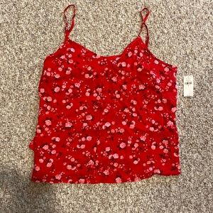 Old navy tank. Loose fit adjustable straps. Buttons down the middle